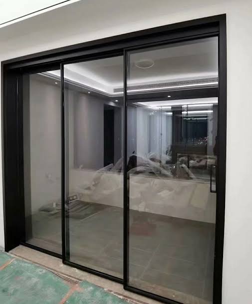 Cửa đi lùa Xingfa 3 cánh, kính dán an toàn 6.38mm 26 Cửa đi lùa Xingfa 3 cánh màu đen hiện đại